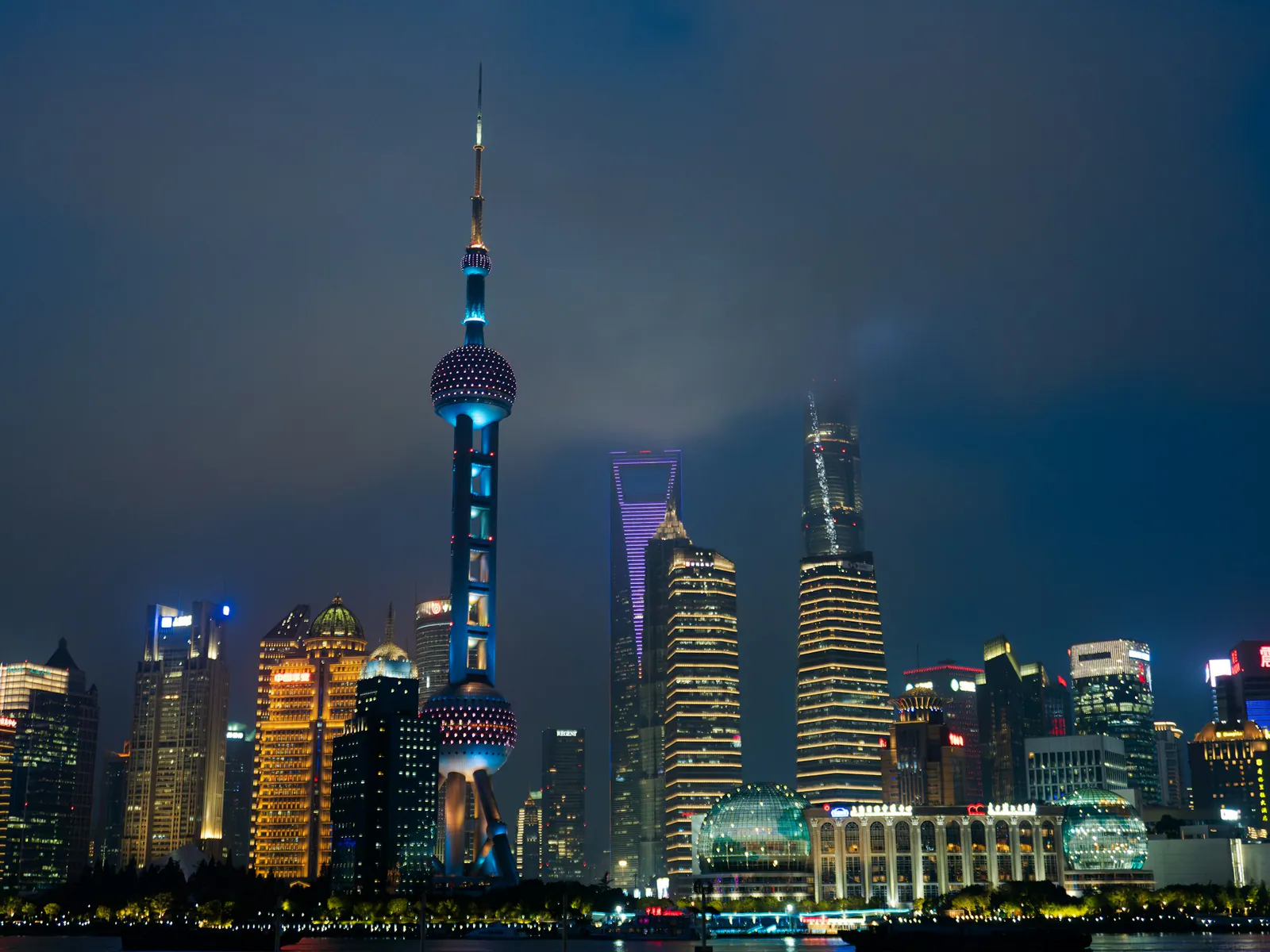 Shanghai’s Pudong skyline across the Huangpu River at night
