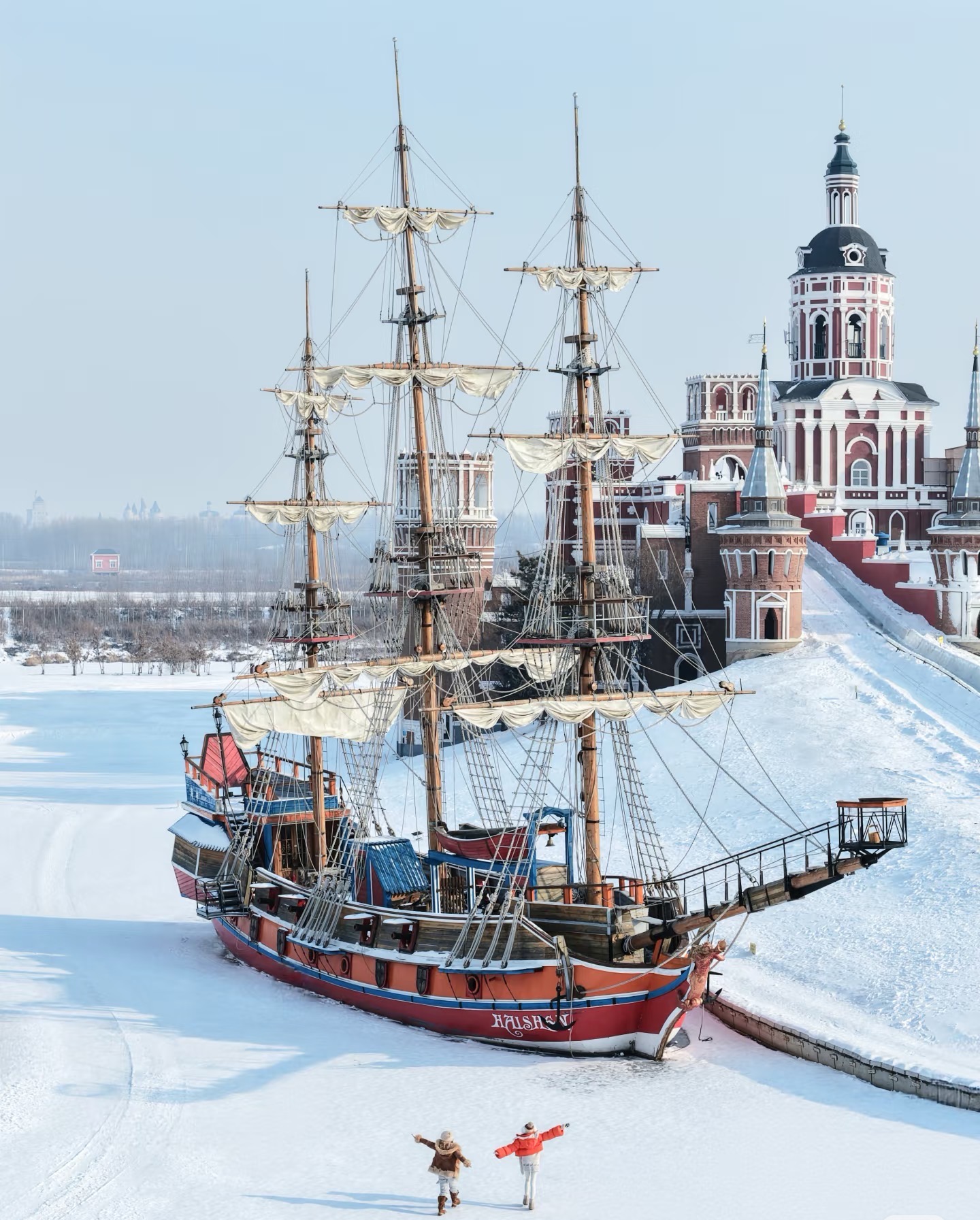 Wooden St Nicholas church at Volga Manor in winter