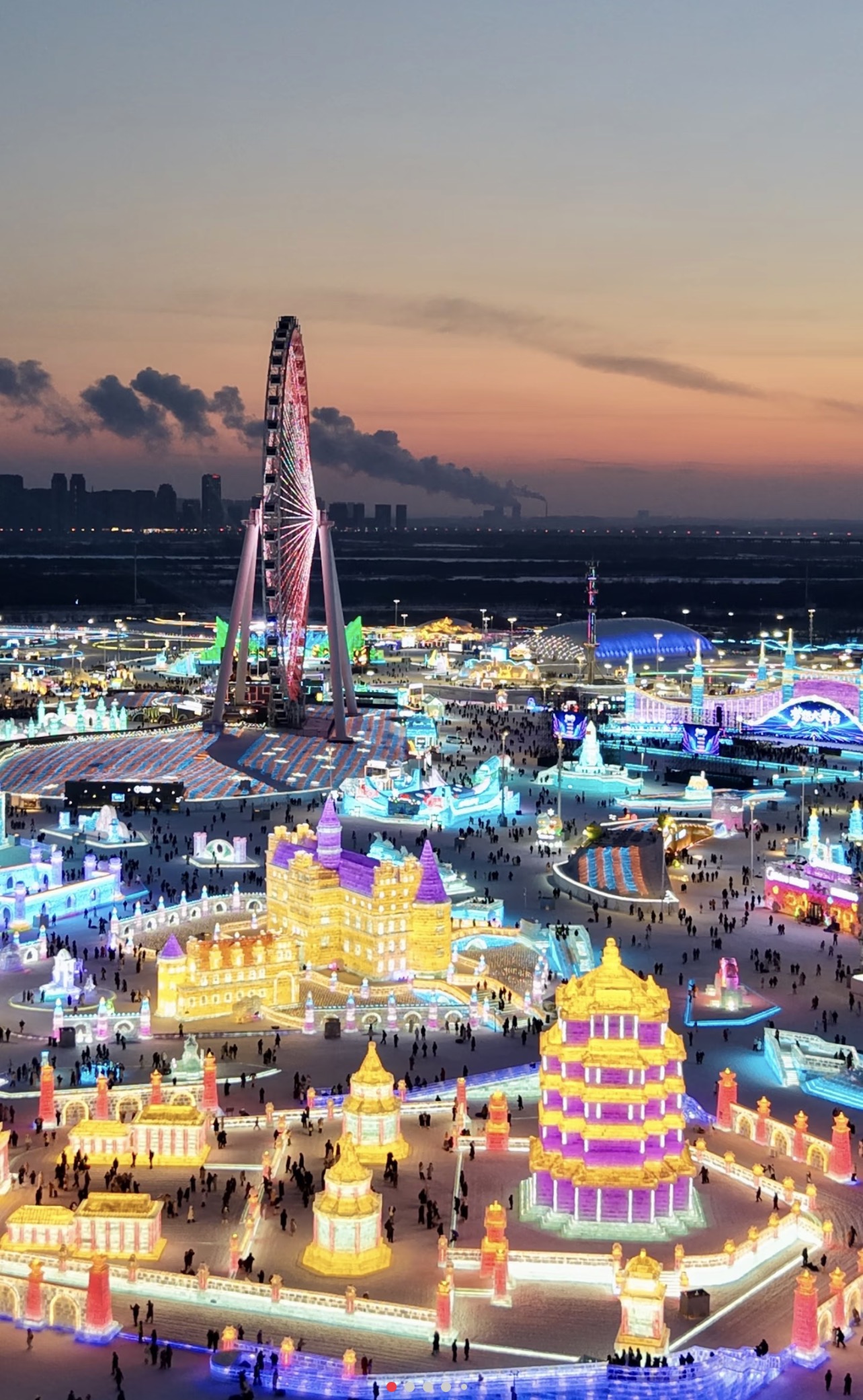 Ice buildings at Harbin Ice and Snow World in daylight